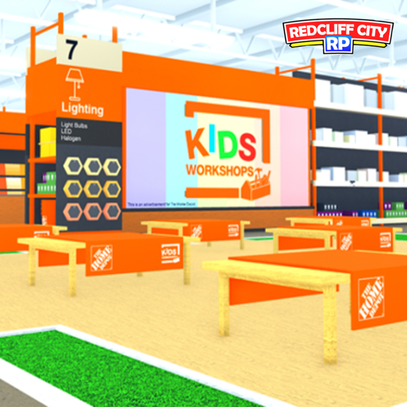 Virtual Home Depot store with tables and a large Kids Workshop logo
