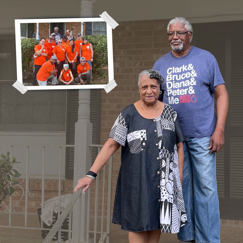 Man and woman standing on porch with pictures of Team Depot