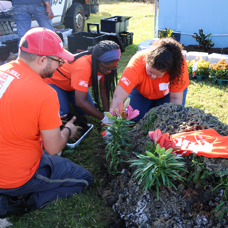 Team Depot volunteers planting flowers