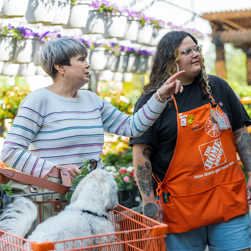 Associate and customer in the garden section