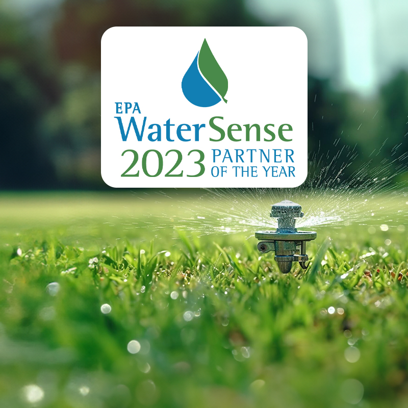 WaterSense logo in front of a lawn sprinkler