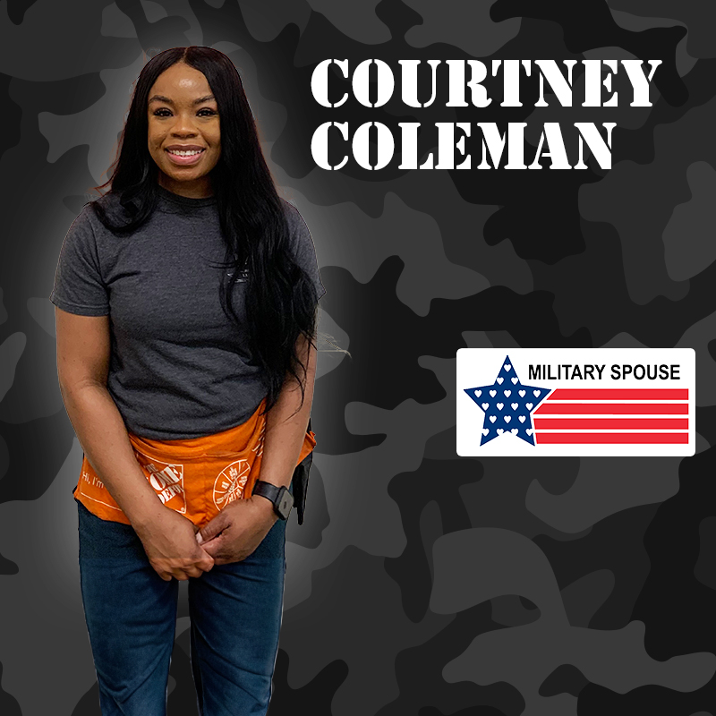 Courtney Coleman in front of dark camo background