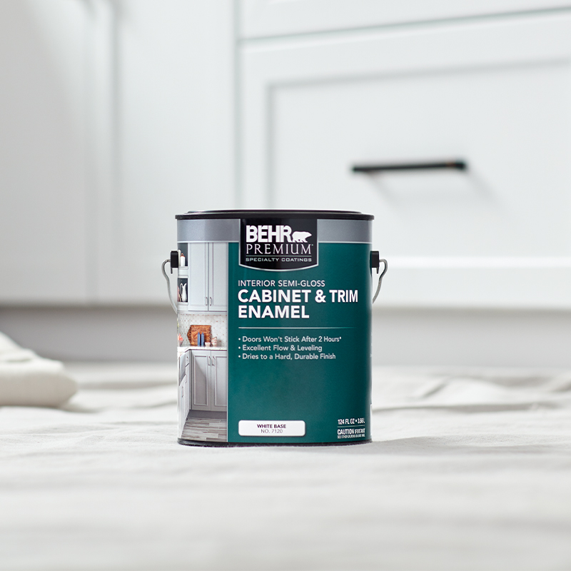 Can of Behr paint sitting on the floor