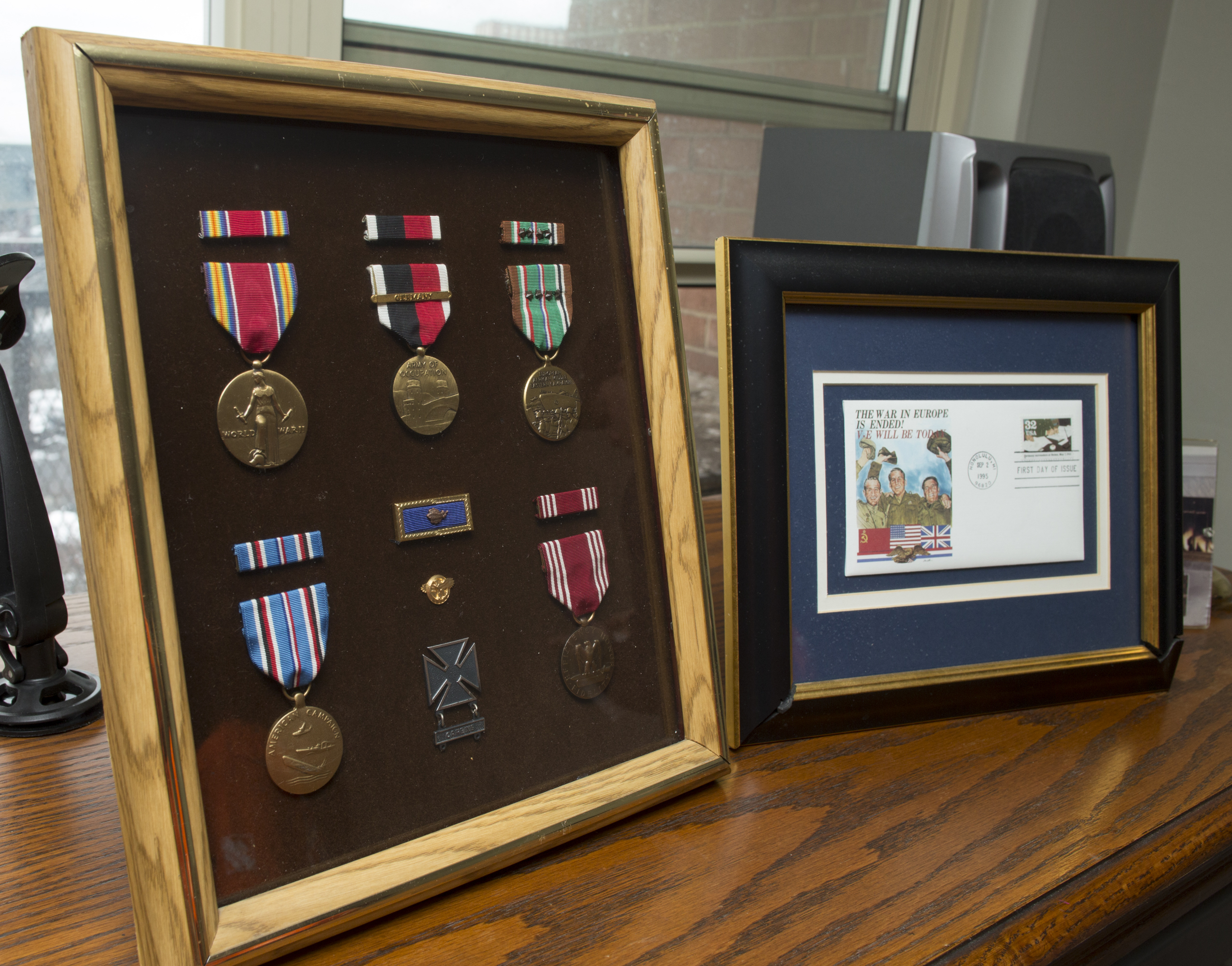Frames featuring medals, postcard from World War II