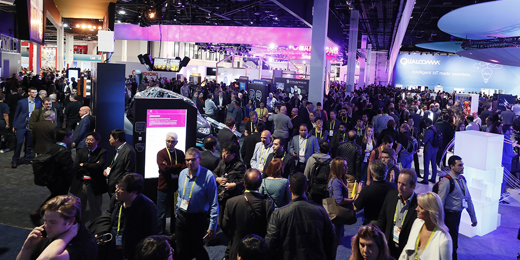 CES attendees on trade show floor