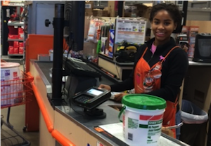 Darrian at register working at The Home Depot