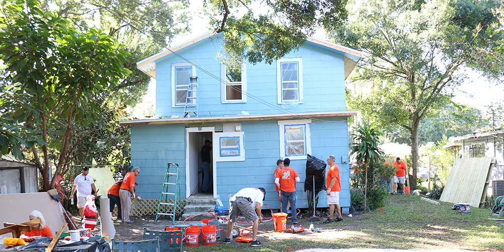 Team Depot volunteers at work on Cruse home