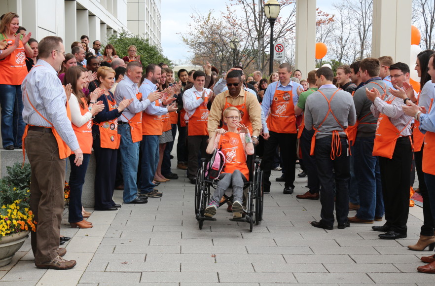 Associates welcome all-star outside Home Depot headquarters