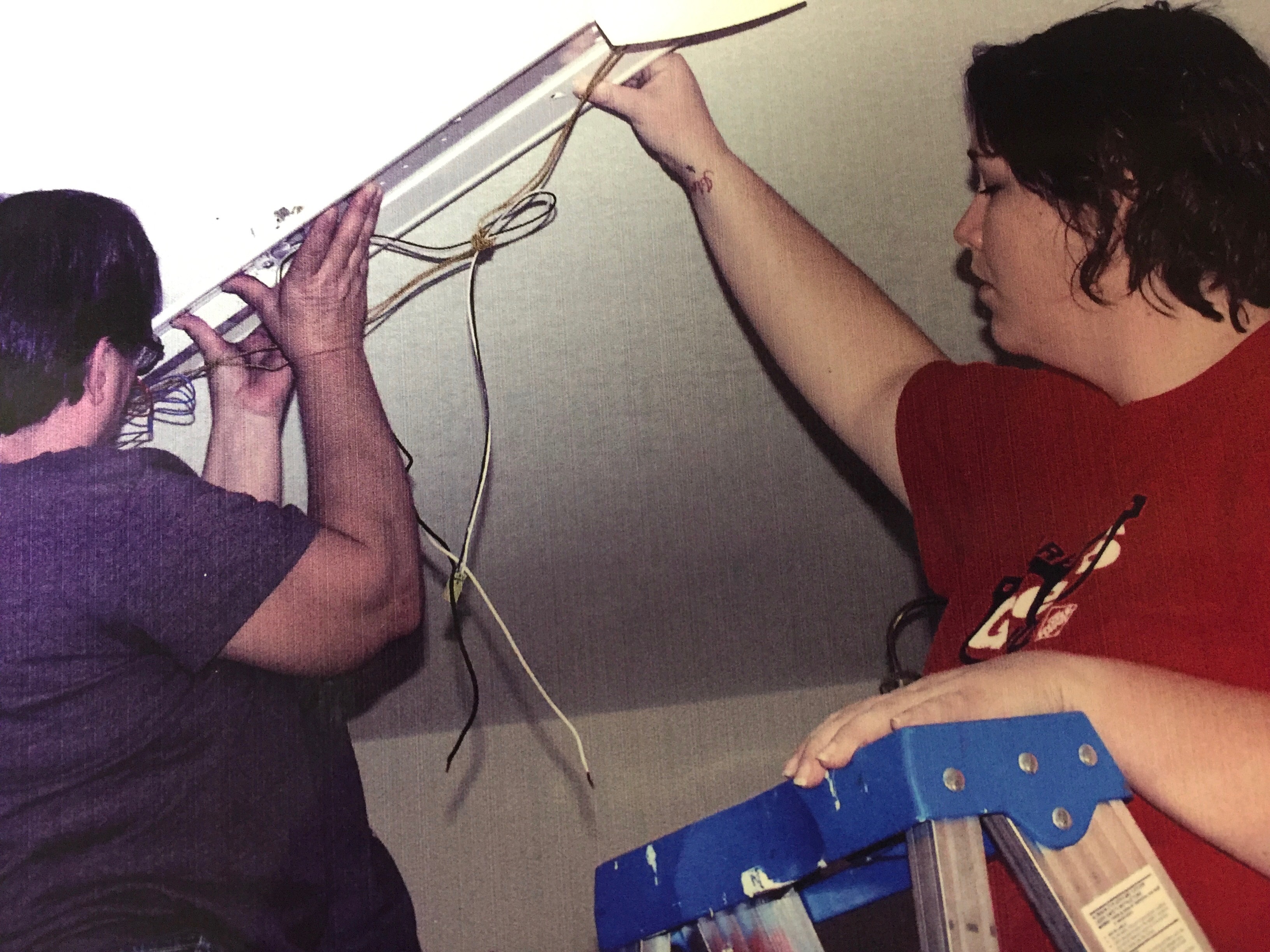 Megan and her mom doing electrical work