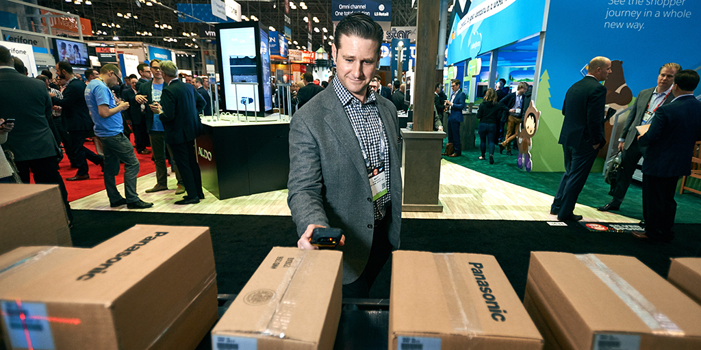 Matt Schweickert scans boxes at NRF tech expo