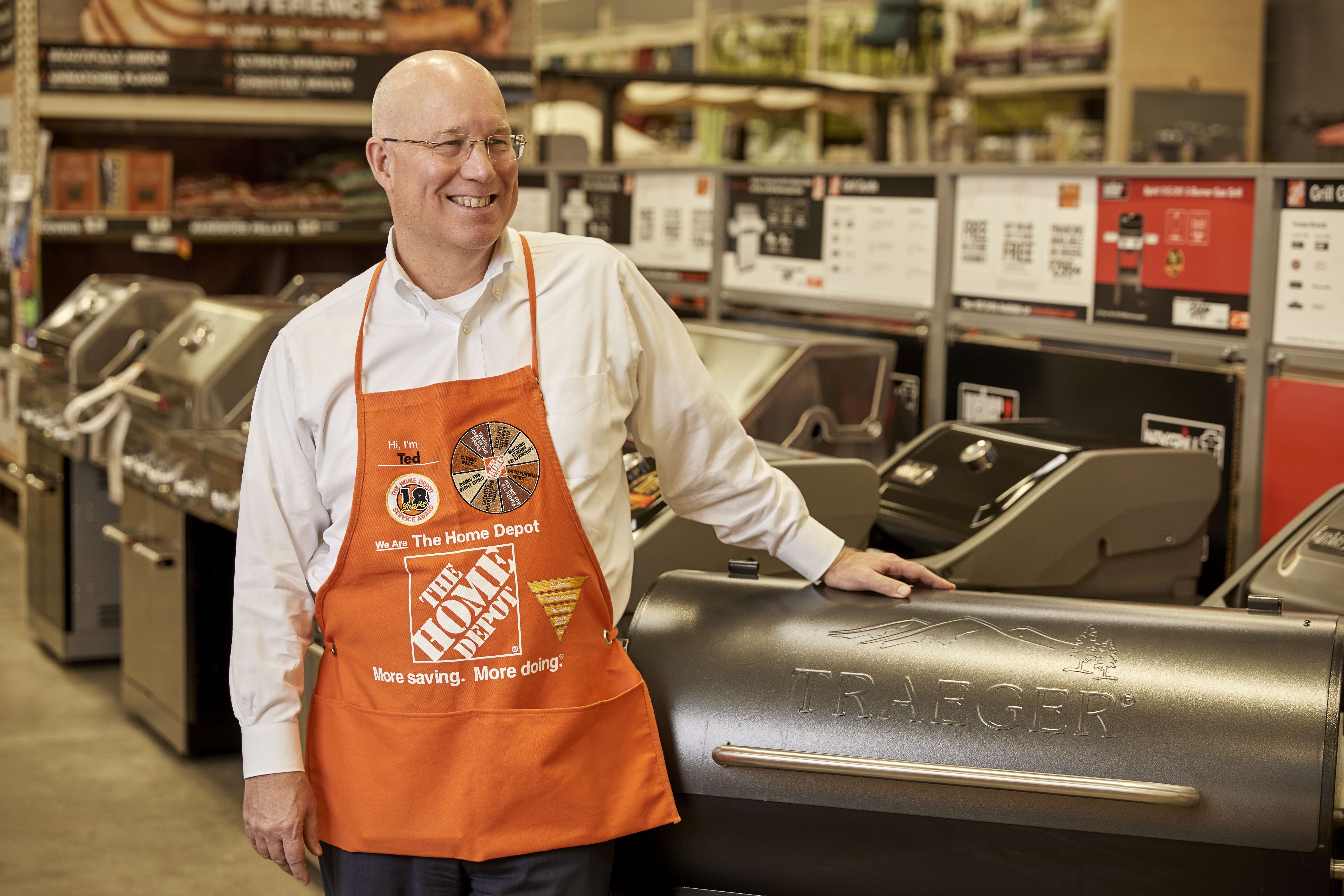 EVP of Merchandising Ted Decker with Traeger grill