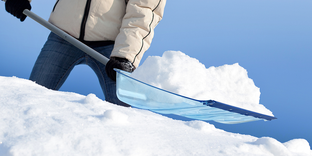 Snow shovel clearing snow