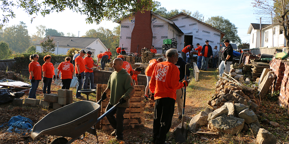 Team Depot volunteers at work in yard