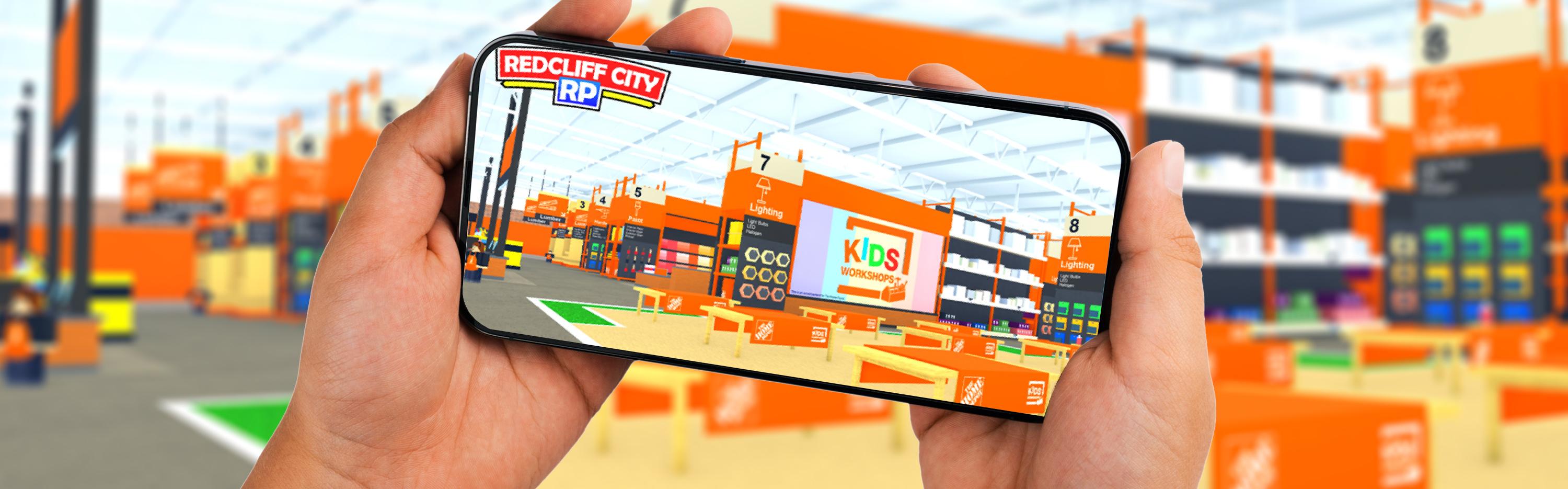 Phone showing virtual Home Depot store with tables and a large Kids Workshop logo
