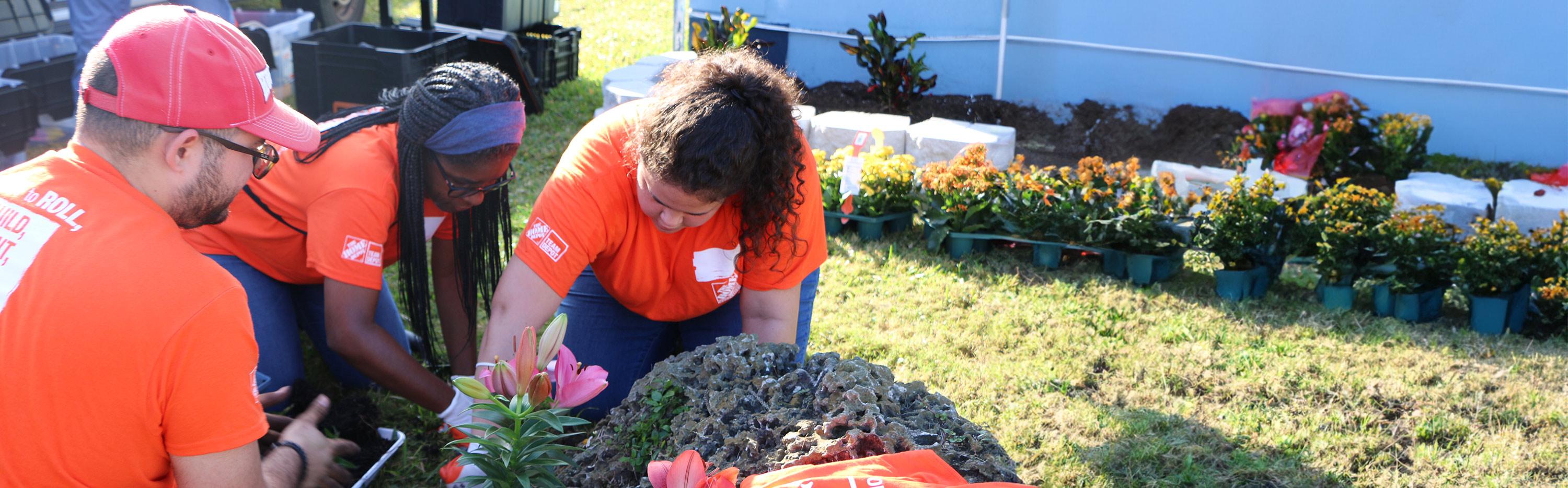 Team Depot volunteers planting flowers
