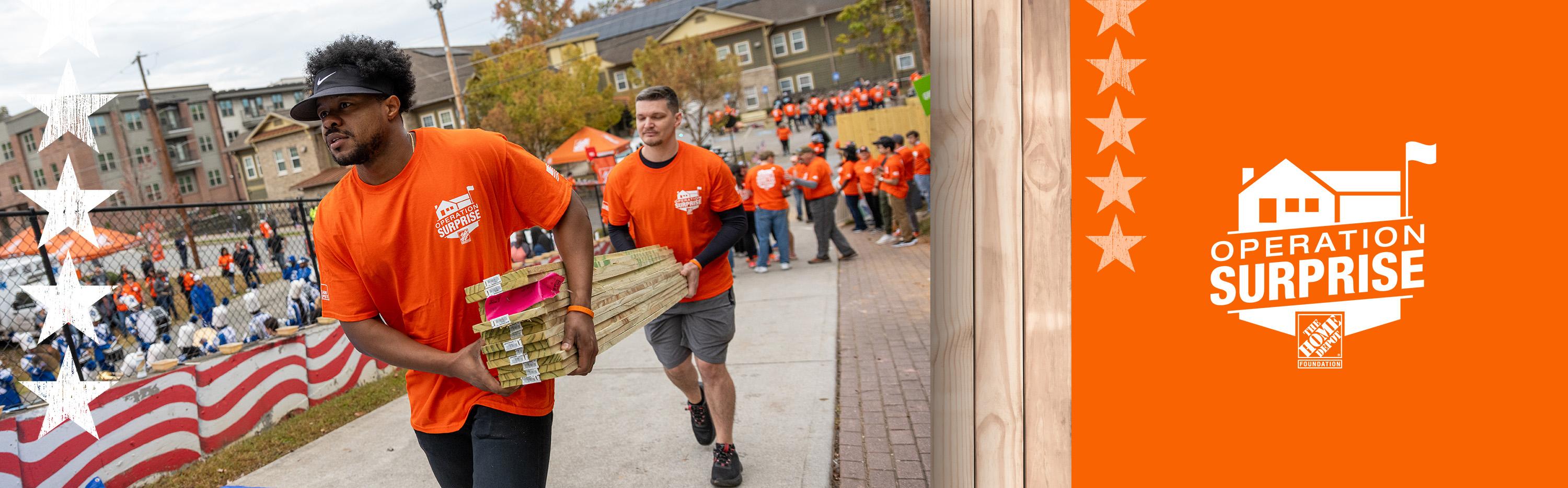 Operation Surprise logo next to volunteers carrying planks of wood