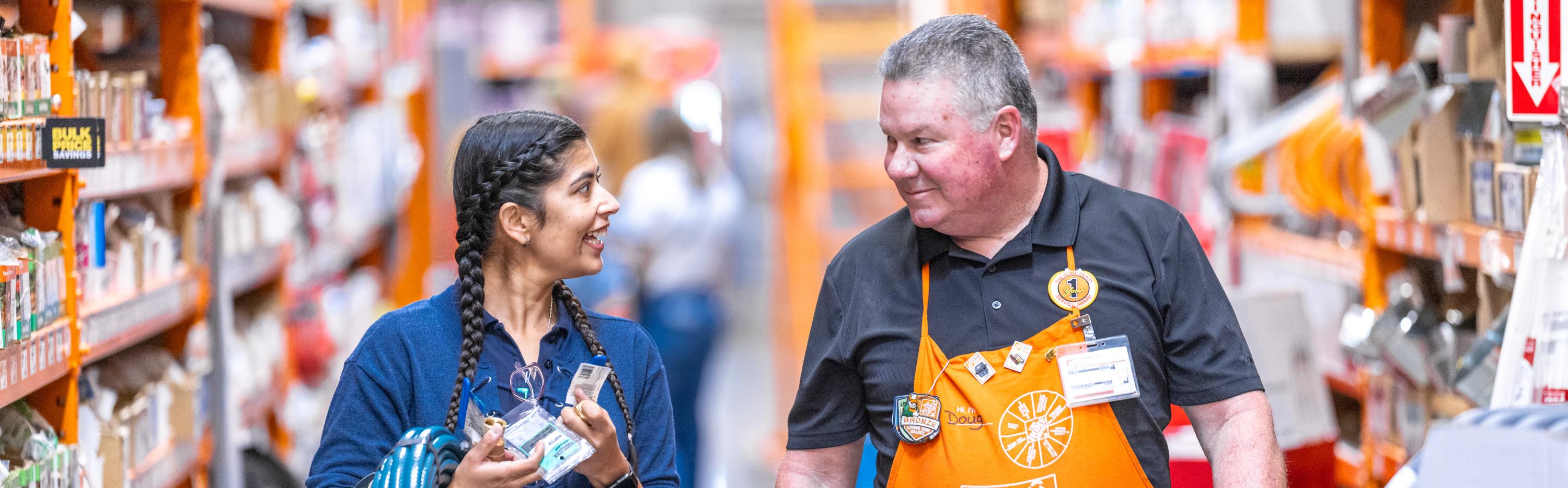 Two Home Depot Associates Talking in the Store