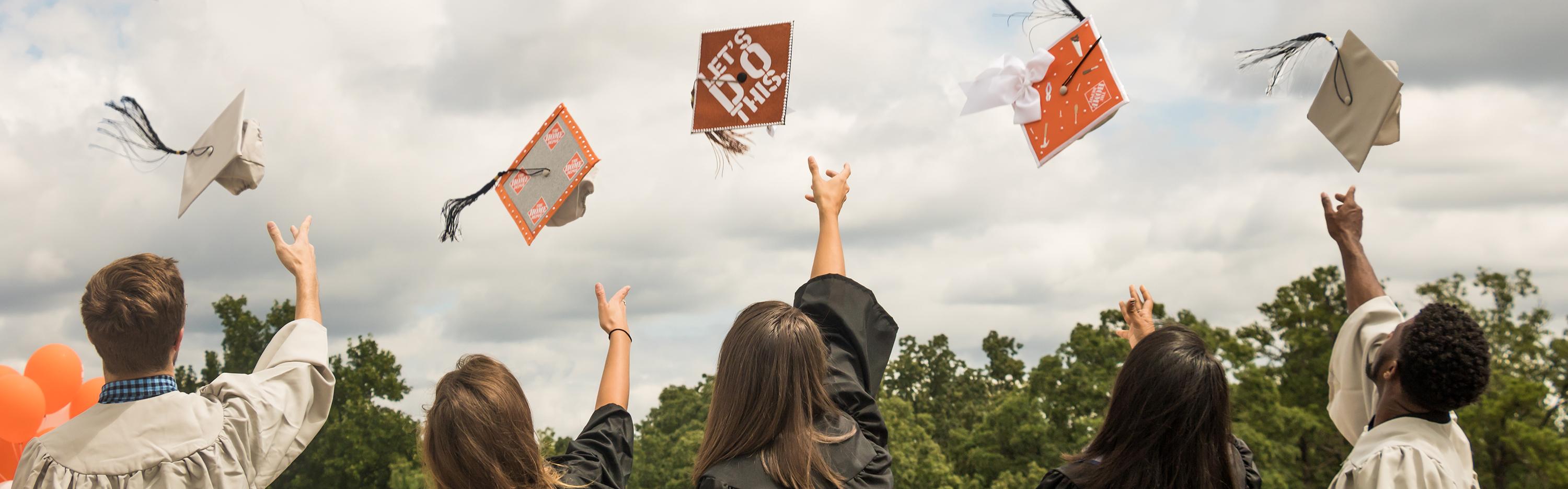 Home Depot interns throw graduation caps