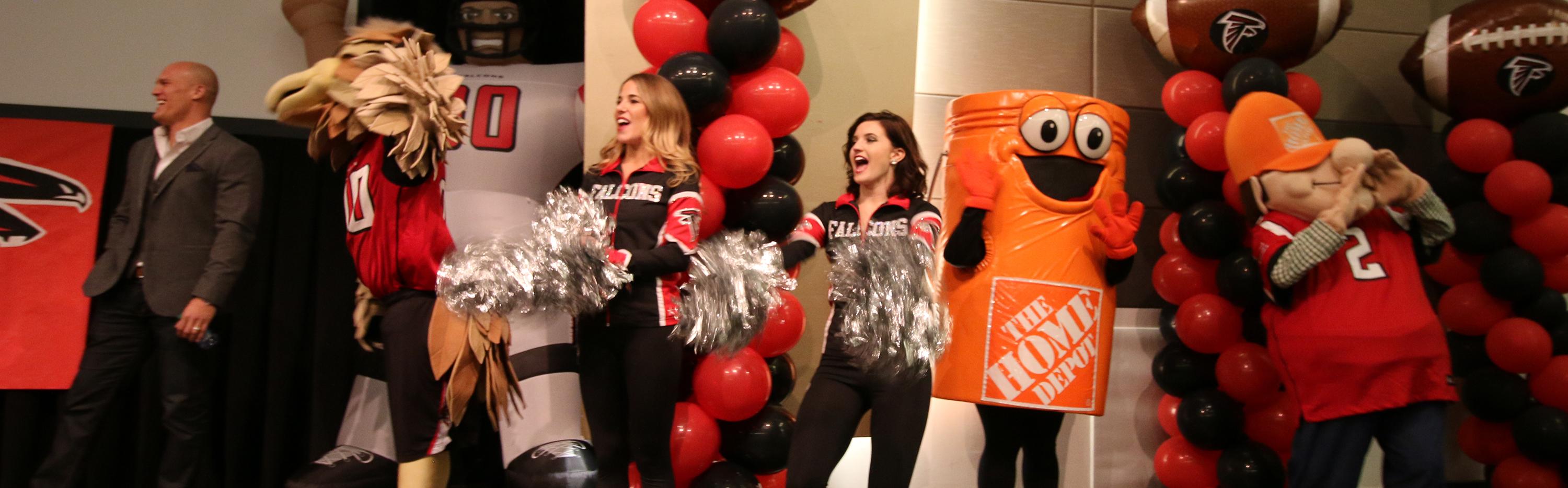 Falcons and Home Depot mascots