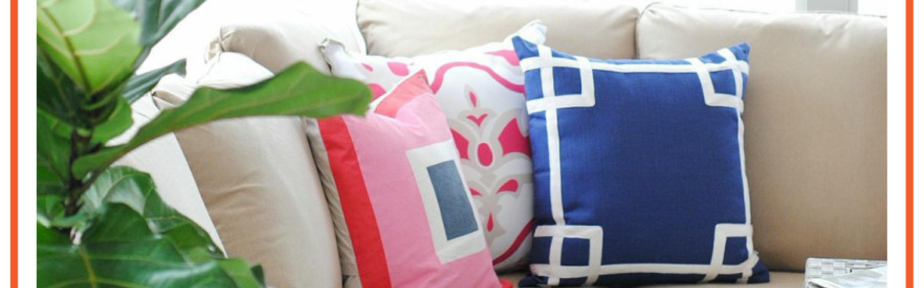 Bright throw pillows on neutral couch