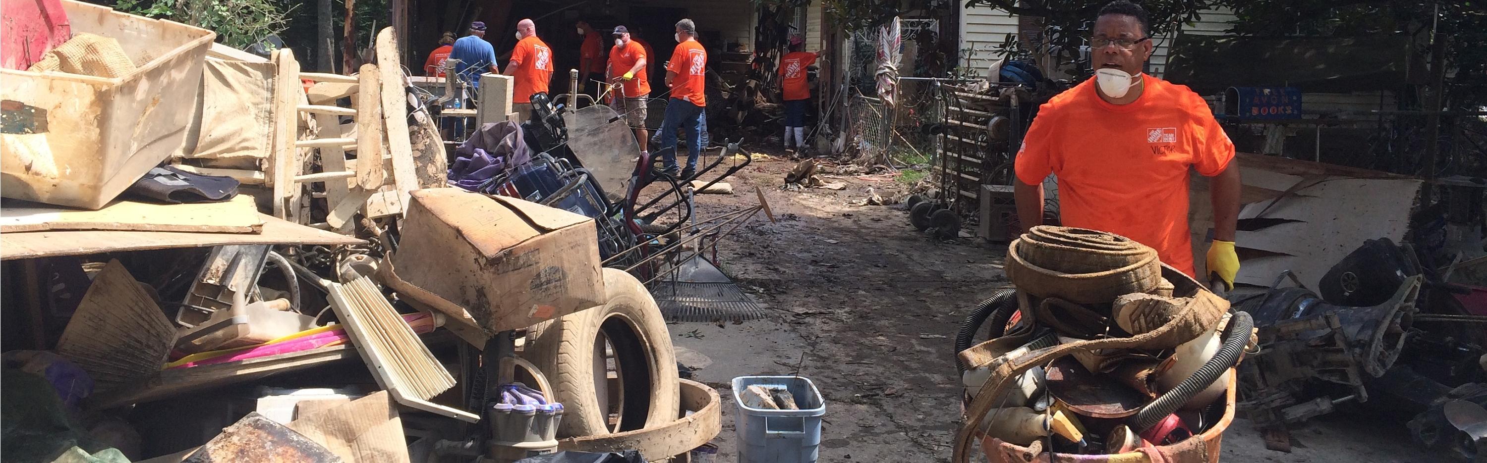 Team Depot volunteers sort through flooding debris in Louisiana 