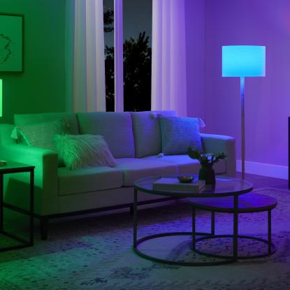A living room lit with smart bulbs