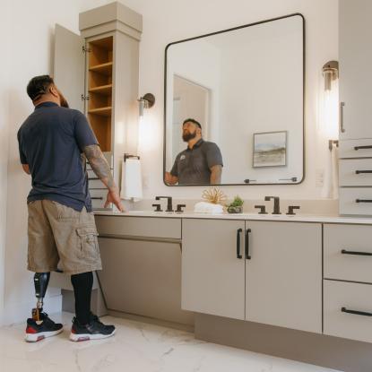 Maverick admiring his new bathroom