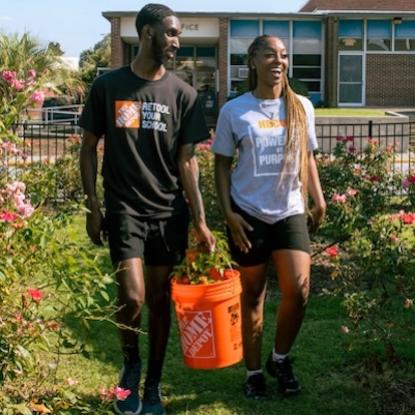 Students walking in a campus garden