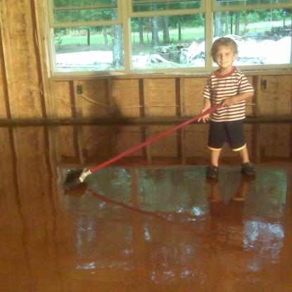 Cara's son cleaning up floor