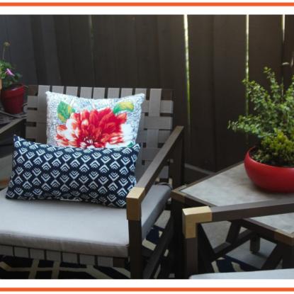 Patio chair with bright pillows