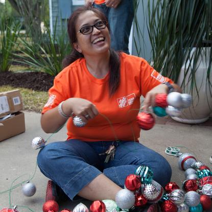 Team Depot volunteer with ornaments