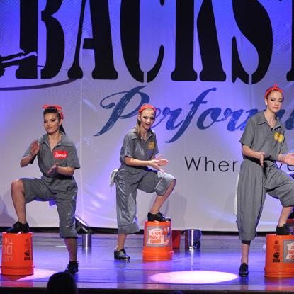 Tap dancers performing with Homer Buckets