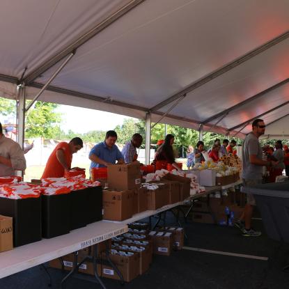 Volunteers packing hurricane relief kits