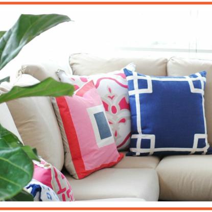 Bright throw pillows on neutral couch