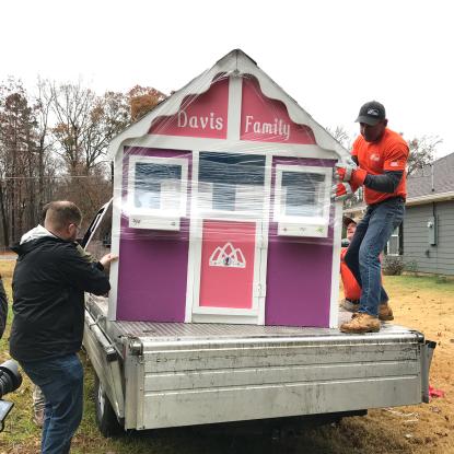 Team Depot delivering playhouse