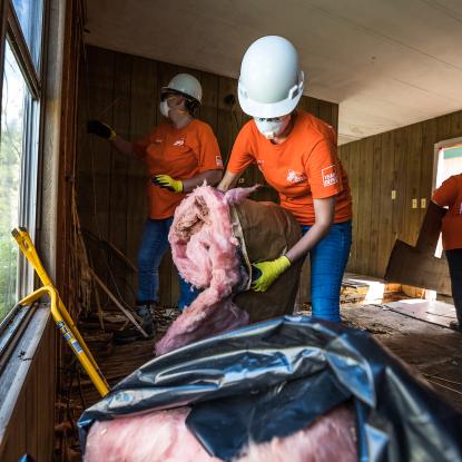 Home Depot volunteers cleaning out a flooded home in Houston