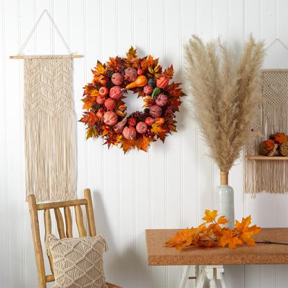 A decorative fall wreath in a living space