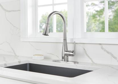 a kitchen sink and faucet
