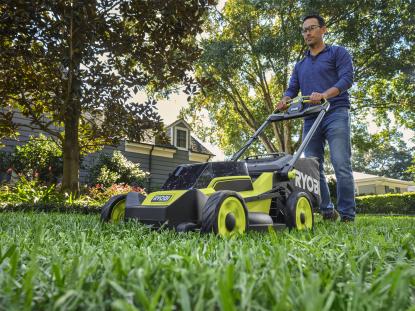 a man mowing his lawn