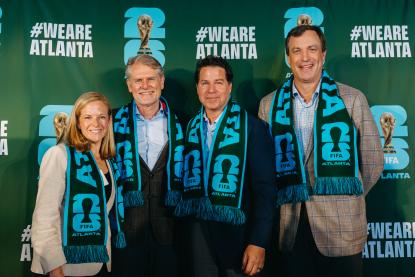 The Home Depot's Allison Kolber poses with other Atlanta World Cup Host Committee Supporters